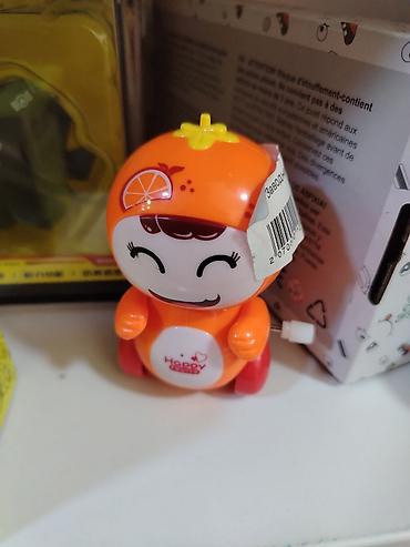 игрушка краб: Заводная игрушка «Happy Crab» в виде милого персонажа-апельсинки. - — 1