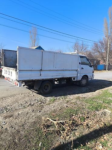 лоток бетон: Грузовой малотоннажный бортовой автомобиль (кабовер). - Тип — 2