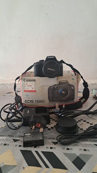 Fotokameralar: Canon EOS 1300D DSLR fotoaparat dəsti Xüsusiyyətlər: - Korpus: Canon — 9