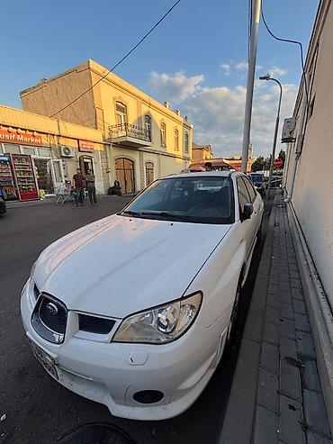 kovş: Subaru Impreza: 2 l | 2007 il 301000 km Sedan — 4