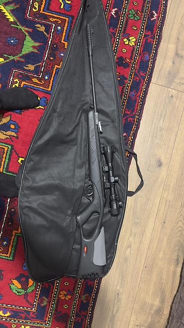 islenmis seyf qapi: 1. Kral N06 Tir tüfəngi. (220 man alınıb) 2. Üzərində 9x40 mm işıqlı — 2