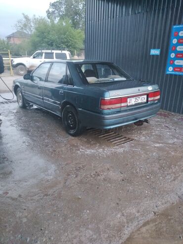 зарядное устройство для электромобиля: Mazda 626: 1991 г., 2 л, Механика, Бензин, Седан