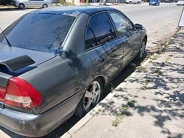 prius teker: Mitsubishi Lancer: 1.3 l | 1997 il Sedan — 3