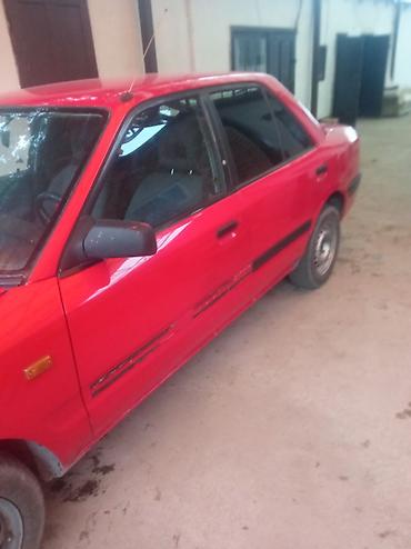 mb 220: Mazda 323: 1992 г., Седан — 3