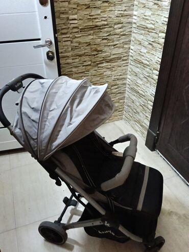 Uşaq geyimi və ayaqqabıları: İki tutacaqlı araba, Kidilo