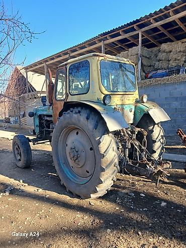 купить трактор юто 1054: Трактор колесный, класс тяги примерно 1,4–2. Кабина закрытая с — 2