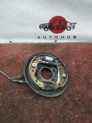 обгонный муфта: Механизм ручного тормоза Toyota Raum NCZ20 1NZ-FE 2004 задн. (б/у)