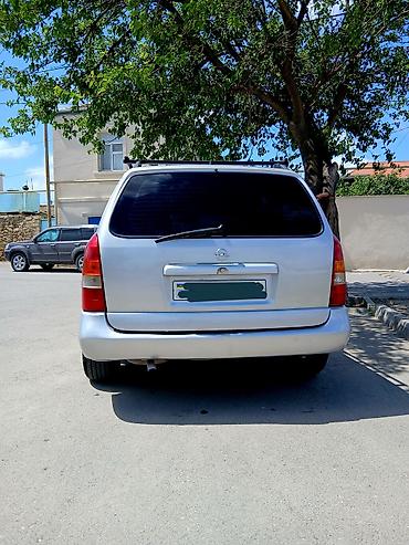 opel astra xectbek: Opel Astra Caravan (Universal) – gümüşü rəng Xüsusiyyətlər: - Kuzov — 3