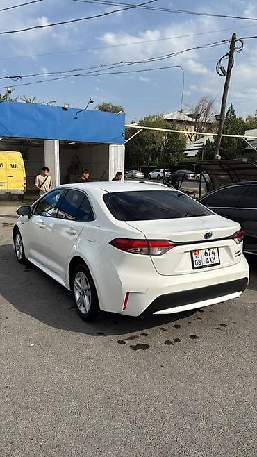 mark x: Toyota Corolla: 2022 г., 1.8 л, Гибрид, Седан — 2