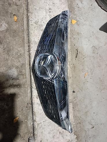 ate: Решетка радиатора Mazda 2005 г., Новый, Аналог — 3