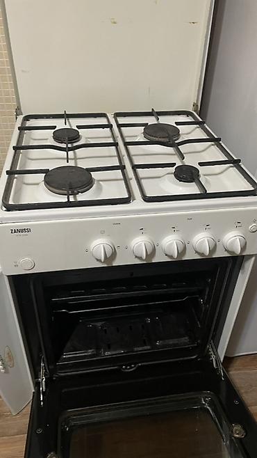 Газовая плита Zanussi ZCG 5500 - 4 газовые конфорки разного диаметра