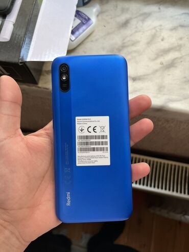 iphone 5s kabrolari: Xiaomi Redmi 9A, rəng - Göy, 
 İki sim kartlı