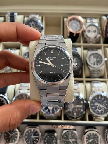 prada eynekleri qiymeti: Tissot 65 AZN paslanmayan rengi getmeyən