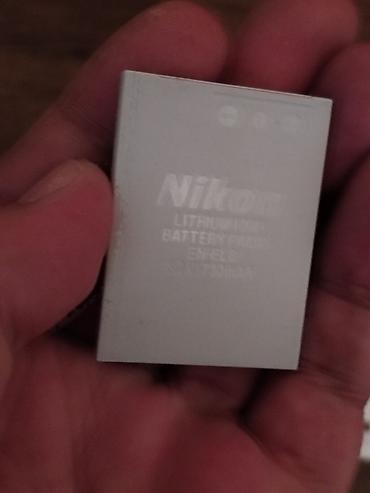nikon: Rəqəmsal fotoaparat batareyaları şekildə olanlardı Sony Nikon — 7