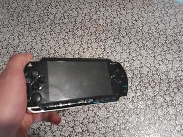 PSP (Sony PlayStation Portable): Psp Məhsul Xaricdən Gətirilib İşlənmişdi.Üstündə 2-ədəd Disk Hədiyyə