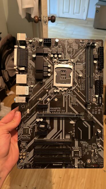 Процессоры: Материнская плата Gigabyte H310