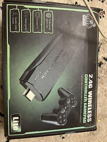 dual shok: Игровая приставка Game Stick Lite с двумя геймпадами Комплектация: - — 2