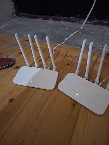 modem usb: İki ədəd Wi‑Fi router Xüsusiyyətlər: - Hər biri 4 xarici antenalı — 1
