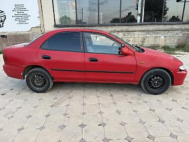 Унаа: Mazda Familia: 1996 г., 1.8 л, Автомат, Бензин, Седан — 4
