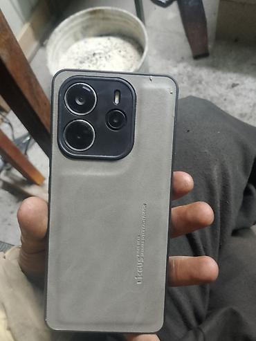 iphone 14 pro max 1t: Смартфон Xiaomi в защитном чехле. Модель с современным дизайном — 1