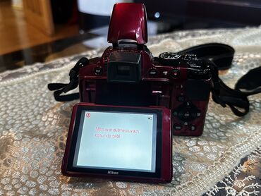 nikon d7000: Nikon coolpix p510 satıram. Heç bir problemi yoxdur.Çəkilişi əladı