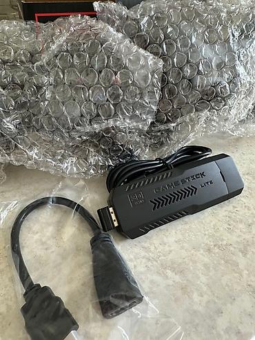 ps 6: Игровая приставка Gamestick X2+ с беспроводным геймпадом 2.4G — 2