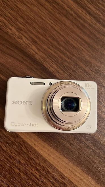 camera sony 1000: Sony Cyber-shot rəqəmsal fotoaparat - Rəng: ağ - Linza: Sony G Lens - — 1