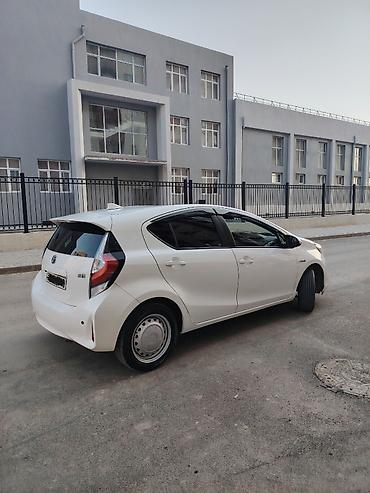 Транспорт: Toyota Aqua: 1.5 л | Хэтчбэк — 3
