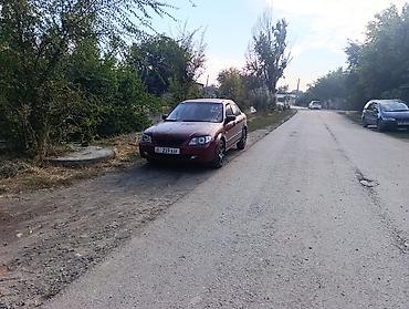 demio sport: Mazda 323: 2001 г., 1.8 л, Автомат, Бензин, Седан — 7