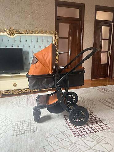 Araba-beşiklər: Uşaq arabası və yemək stolu dəsti 1) Narıncı qış kolyaskası — 1