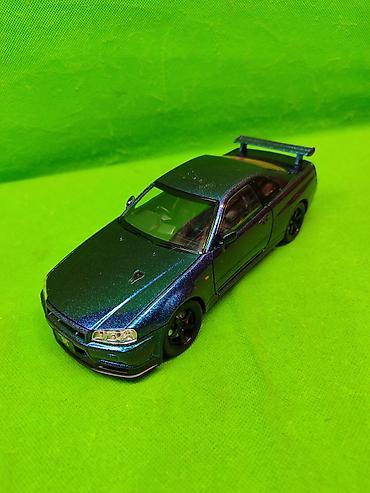 Игрушки: Моделька Нисан Скайлайн машинка игрушка в ассортименте🚘 Комплектация — 3