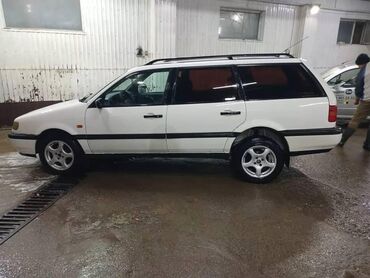 диск на пассат: Универсал Volkswagen Passat белого цвета, оснащенный багажником на