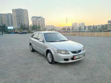 мазда 300: Mazda 323: 2002 г., 1.6 л, Механика, Бензин, Хэтчбэк