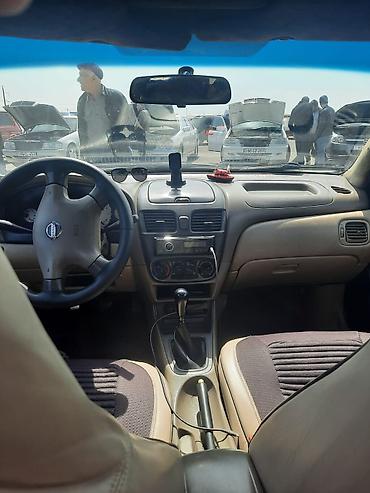 2 5 dizel mator: Nissan Sunny: 1.3 l | 2006 il Sedan — 5