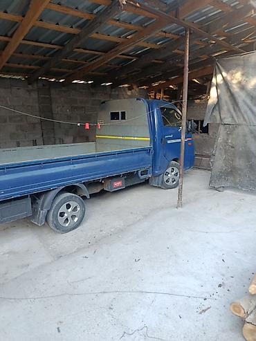 с кму: Hyundai Porter II, бортовой малотоннажный грузовик, синий. Кузов и — 2