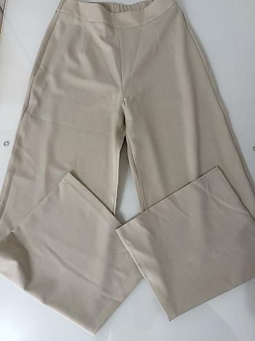 pantalone s: Ženski elegantni komplet – sako i pantalone u bež/ekru nijansi. - — 3