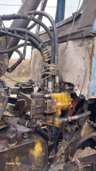 Ekskavatorlar: Universal ekskavator-yükləyici traktor - Ön bıçaq (dozer) və arxa — 6