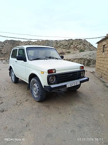 niva diskleri satilir: LADA Niva 4x4, ağ sarı rəngdə, universal kuzov. Xüsusiyyətlər: - Tam — 5