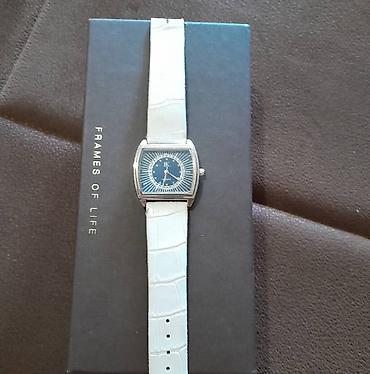dunhill satovi: Elegantni ženski ručni sat sa pravougaonom/tankim kućištem i — 1
