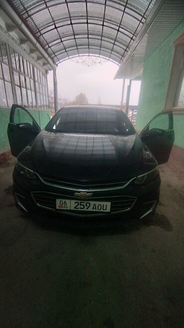 shevrolet cruz: Автомобиль Chevrolet Malibu черного цвета. Эта модель представляет