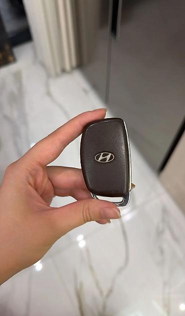 болон ключ: Смарт-ключ Hyundai с функцией дистанционного управления. Брелок — 1