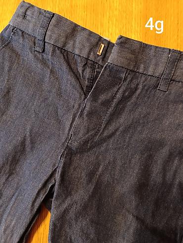 Paketi dečije odeće: Decaci farmerke, pantalone, bermude,sorcevi.Cene do 500din, velicina — 2