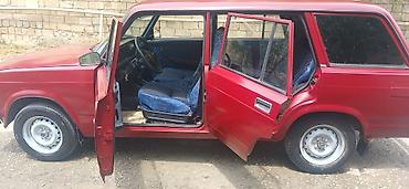 опель зафира а: VAZ 2104, qırmızı rəng, universal kuzov. Xüsusiyyətlər: - Arxa — 2