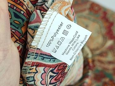 getry xxl: Spodnie materiałowe damskie, rozmiar 2XL — 4
