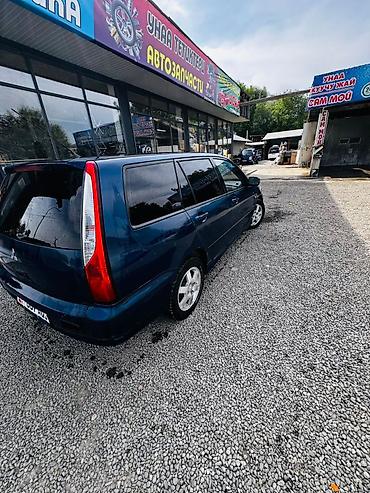 климат одиссей: Mitsubishi Lancer: 2004 г., 1.6 л, Типтроник, Бензин, Универсал — 2