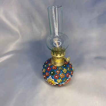 Digər ev dekoru: Zərif naxışlı və parlaq rəngli mina qapaqlı qab. Bu qab mürəkkəb — 8