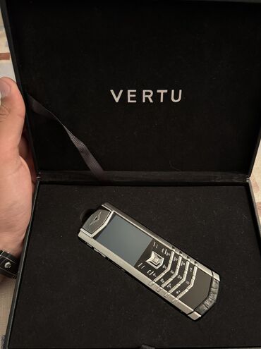 basovka qutusu: Vertu Ti