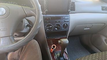 Унаа: Toyota Corolla: 2003 г., Автомат, Бензин, Седан — 3