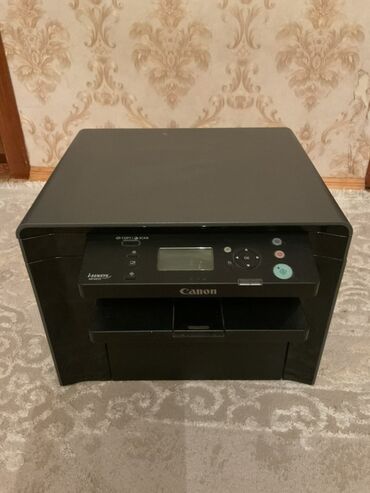 Modemlər və şəbəkə avadanlıqları: Canon i-SENSYS MF4410 modeli lazer çap texnologiyasına malikdir. Qara