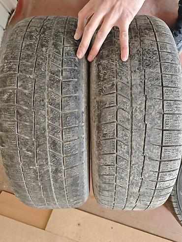 зимние шины 22560 r18: Продаются 2 автомобильные шины Bridgestone Blizzak Studless. 1000сом — 1